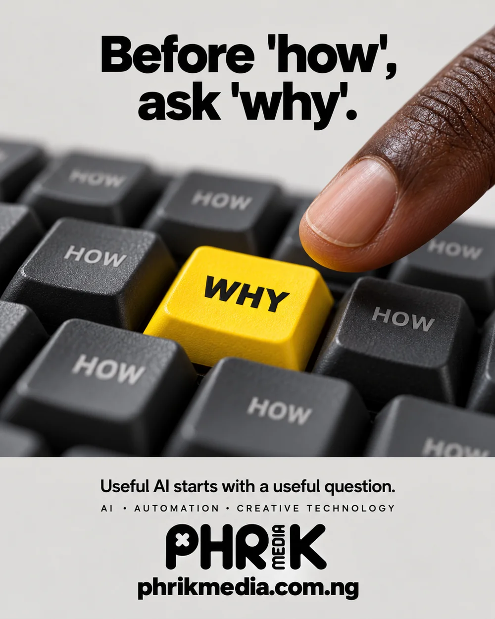 PhrikMedia concept: a yellow WHY key among black HOW keys.